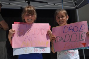 Reese and Mary with their Drop Daddies signs