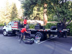 Gary hangs the new banners on the parade truck